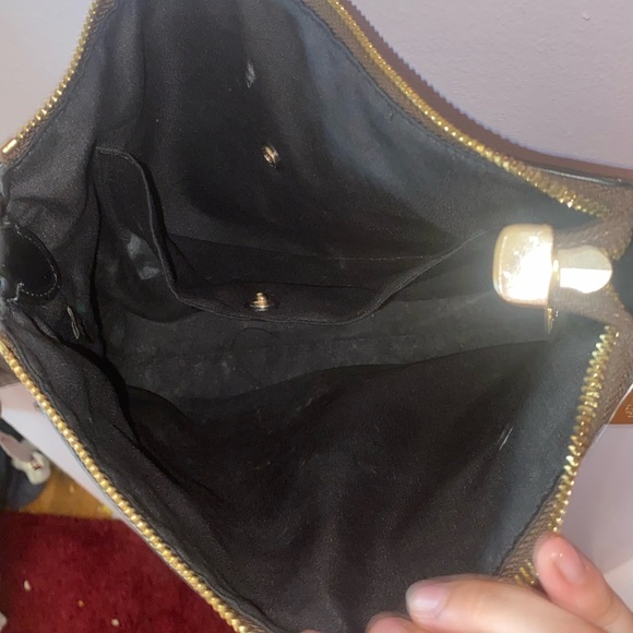 This is a brown and black coach satchel - Picture 5 of 7